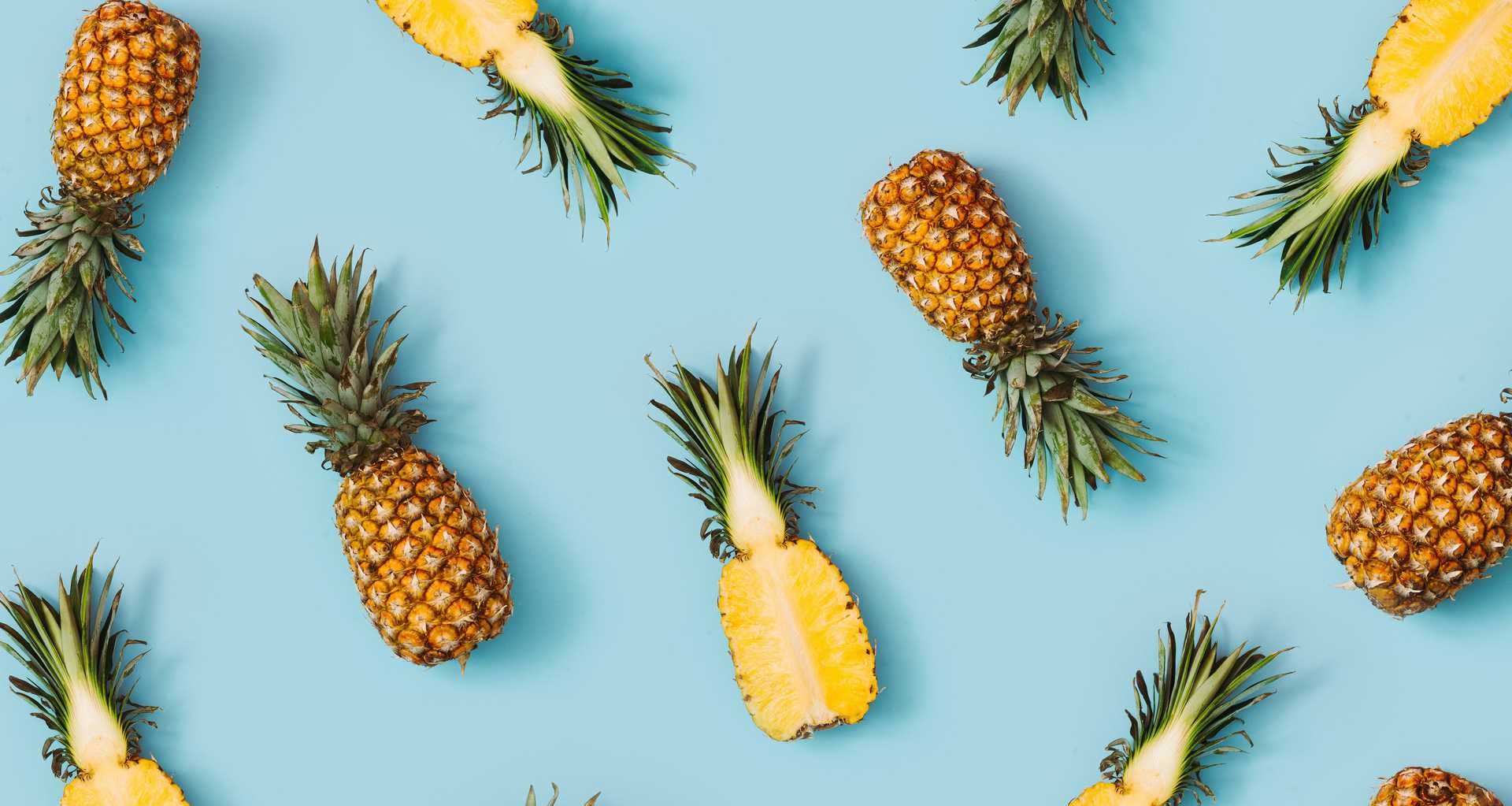 Hero background image of many pineapples